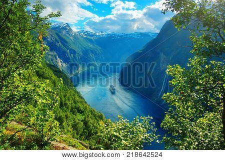 Breathtaking view of Sunnylvsfjorden fjord and famous Seven Sisters waterfalls, near Geiranger village in western Norway.