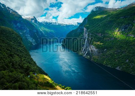 Breathtaking view of Sunnylvsfjorden fjord and famous Seven Sisters waterfalls, near Geiranger village in western Norway.