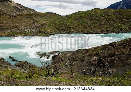 Rapids of the Salto Grande waterfall in Torres del Paine National Park between Lago Nordenskjold and Lago Pehoe