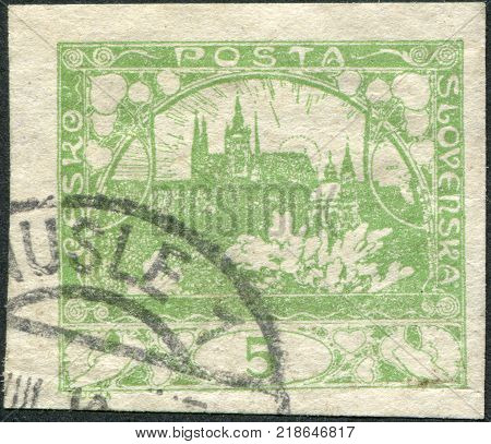 CZECHOSLOVAKIA - CIRCA 1918: A stamp printed in the Czechoslovakia, shown Hradchany (St. Vitus Cathedral) and St. Nicholas Church, Prague, circa 1918