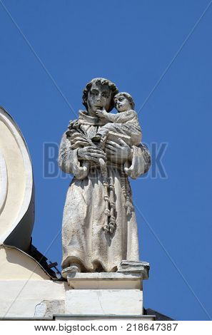 CAKOVEC, CROATIA - JULY 02: Saint Anthony of Padua on the top of Parish Church of Saint Nicholas in Cakovec, Croatia, on July 02, 2016.