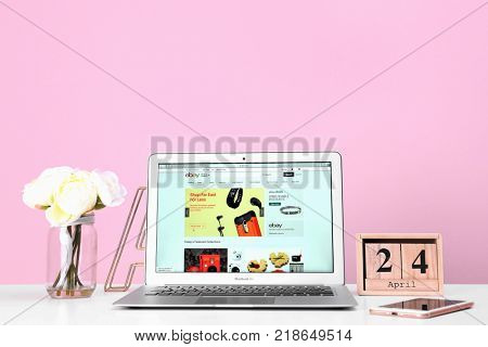KYIV, UKRAINE - OCTOBER 26, 2017: Apple MacBook Air with eBay homepage on screen. eBay is multinational e-commerce corporation