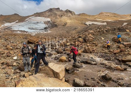 Kamchatka Peninsula, Russia - August 26, 2016: Tourists during the ascent to the active volcano Mutnovsky in Kamchatka.