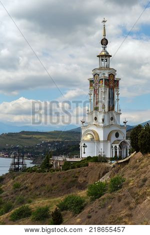 Malorechenskoye, Russia - June 07, 2016: Church-lighthouse of St. Nicholas the Miracle-Worker of Myra in the village of Malorechenskoye on the southern coast of the Crimea