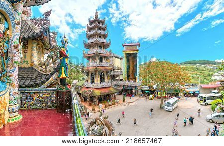 Lam Dong, Vietnam - November 28th, 2017: Beauty Pagoda architecture with monumental associated pylons from millions pieces crockery create composite shapes attract Buddhist in Lam Dong, Vietnam