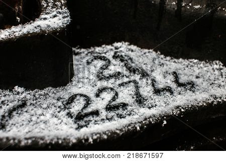 Black industrial background with digits. somewhere in railstation