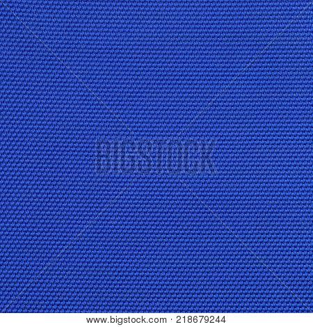 Synthetic fabric texture. Background of blue textile