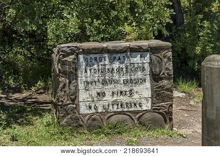 Stonesign for Thukela gorge in Royal Natal Park Drakensberg mountain, South Africa