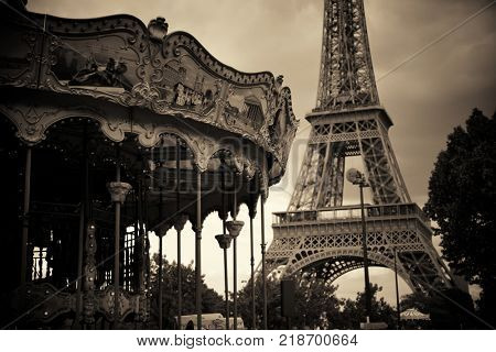 PARIS, FRANCE - MAY 13: Carrousel and Eiffel Tower on May 13, 2015 in Paris. With the population of 2M, Paris is the capital and most-populous city of France