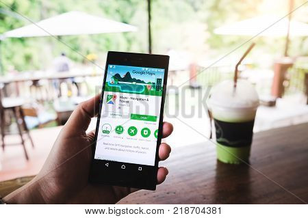 Chiang Mai Thailand - 13 Nov 2017: A Man Hand Holding Screen Shot Of Google Maps App Showing On Sony