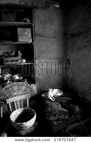 old attic with wooden ceiling and scattered knick knack