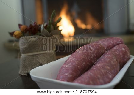 pork sausage to roast at the home fireplace