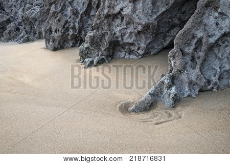 Intimate Landscape Image Of Rocks And Sand On Broadhaven Beach In Pembrokeshire Wales
