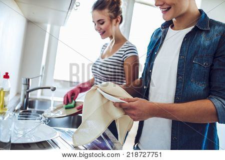 Couple Is Doing Cleaning At Home