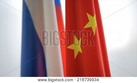 Russian And Chinese Flags. Two Flags Of Russia And China Symbolizing The Cooperation Between The Two