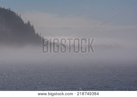 Sea smoke on the bay. Sea smoke is surface fog that appears over the ocean when it is very cold out.
