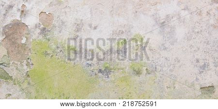 Old grungy wall with damaged plaster abstract banner background texture