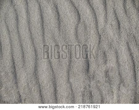 background stripes from the wind on the sand
