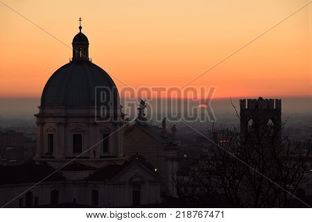 The dome of Brescia Cathedral in backlight at sunset - Brescia - Lombardy - Italy 04