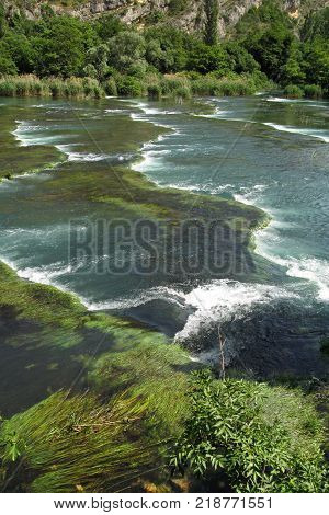 Krka River with its waterfalls and natural phenomena