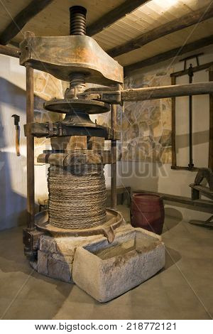 Ancient olive oil production machinery mechanical manual press and stone oil container on Island Korcula in Croatia