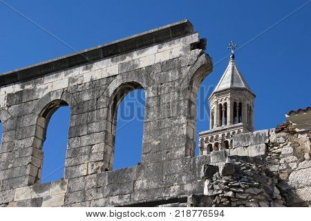 The wall above silver gate and bell tower of cathedral of St Domnius
