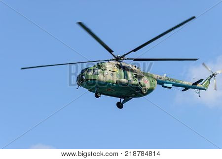 Tyumen, Russia - August 4, 2017: International Army Games. Engineering Formula contest. Military helicopter MI-8 in the cloudy sky