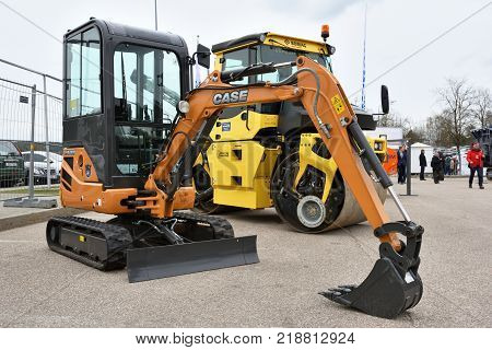 VILNIUS LITHUANIA - APRIL 27: Case mini excavator on April 27 2017 in Vilnius Lithuania. Case Construction Equipment is a brand of construction equipment from CNH Industrial