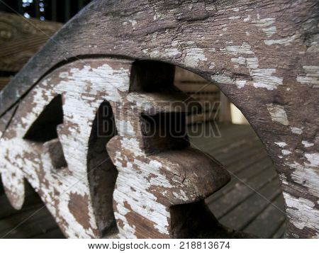 old wood bench. arm old wood bench with a carving getting crack