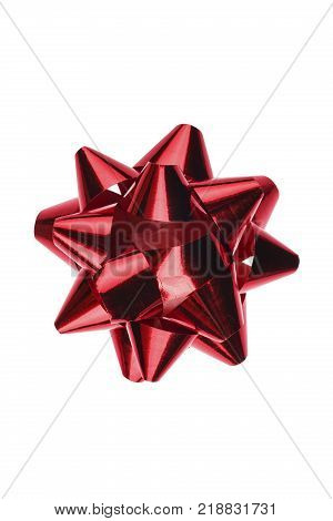 A holiday symbol, an element of decor. Red bow isolated on white background.