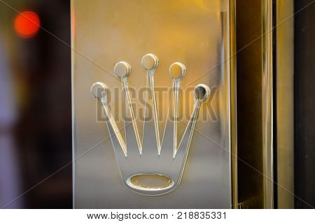 Milan Italy - September 24 2017: Rolex logo in a store in Milan. Fashion week Rolex shopping