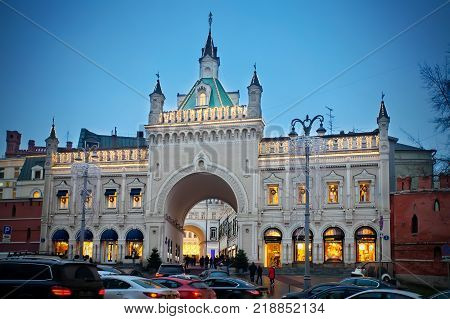 Moscow Russia - December 16 2017: Archway to Tretyakovsky Proyezd (Tretyakov Drive) at night winter in Moscow. It is a short street in Kitai-gorod and known as one of the most expensive shopping areas in the world.