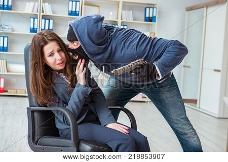 Criminal taking businesswoman as hostage in office
