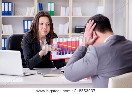 Business meeting between businessman and businesswoman