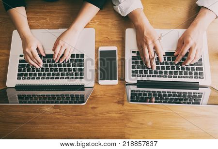 Couple of business using laptop in coffee shop.business,accounting concept.