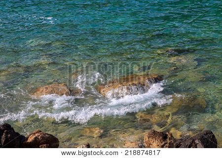 Rocks on the beach on Corfu in Greece