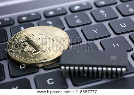 bitcoin on laptop keyboard exchage crypto currency mining