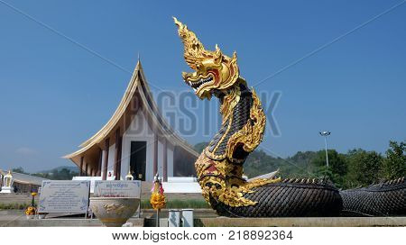 Naga Statues Group Over Blue Sky Background