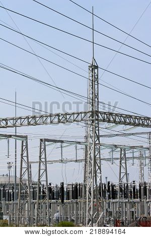 Wires, insulators and electrical poles of power plant Sisak in Croatia