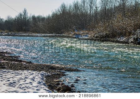 River in Winter. Rapids of Stormy River. Winter Landscape