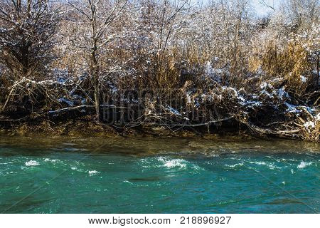 River in Winter. Rapids of Stormy River. Winter Landscape