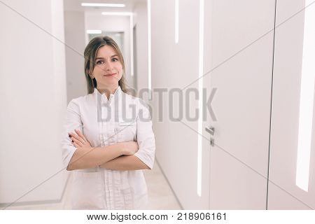 The Young nurse portrait against the background of the hospital.