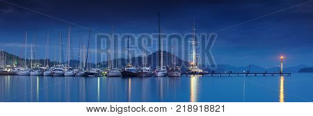 marina at night with moored yachts in Gocek Turkey