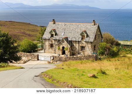 Rural panorama from Scotland. House from Highlands region. Travel destinations