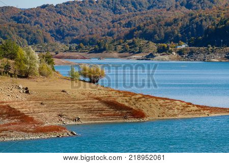 View Of The Scenic Aoos Artificial Lake Shore In Epirus, Greece