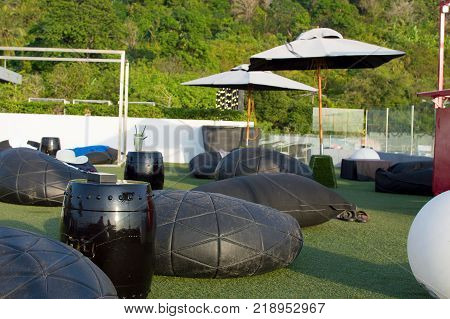 Bean bags in rest relax area on rooftop.