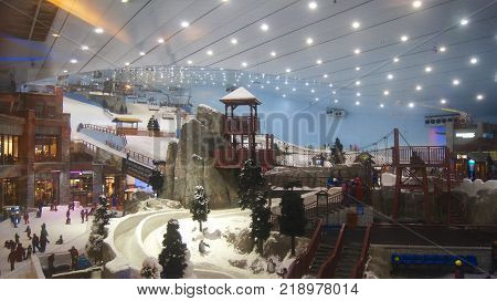 DUBAI, UNITED ARAB EMIRATES - MARCH 30th, 2014: Alpine ski in Dubai. Ski Dubai is an indoor ski resort with 22, 500 square meters of indoor ski area. It is a part of the Mall of the Emirates.