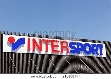Saint Bonnet de Mure, France - June 18, 2017: Intersport logo on a facade. The Intersport Group is an international sporting goods retailer