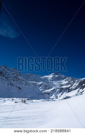 swiss alps near simplon pass during winter
