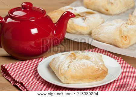 Homebaked Hungarian Cheese Puff Pastry Parcels. Iced Sugar